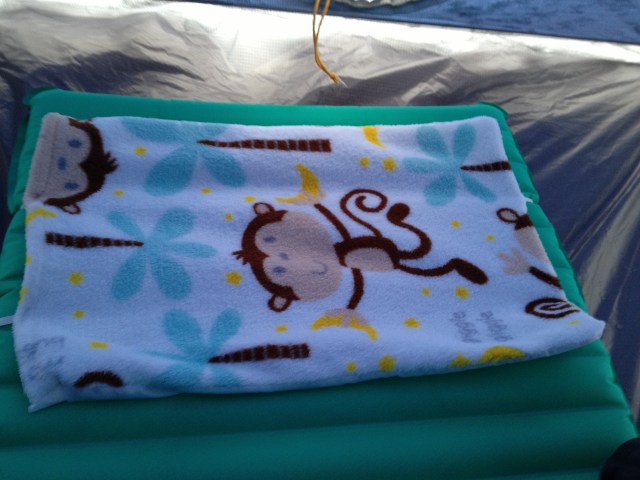 The Monkey Pillow is actually a pillowcase that attaches to your pad